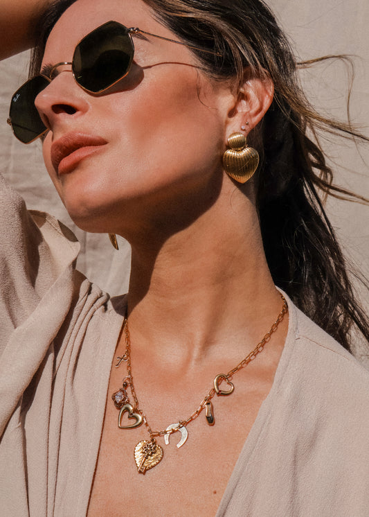 gold heart-shaped earring